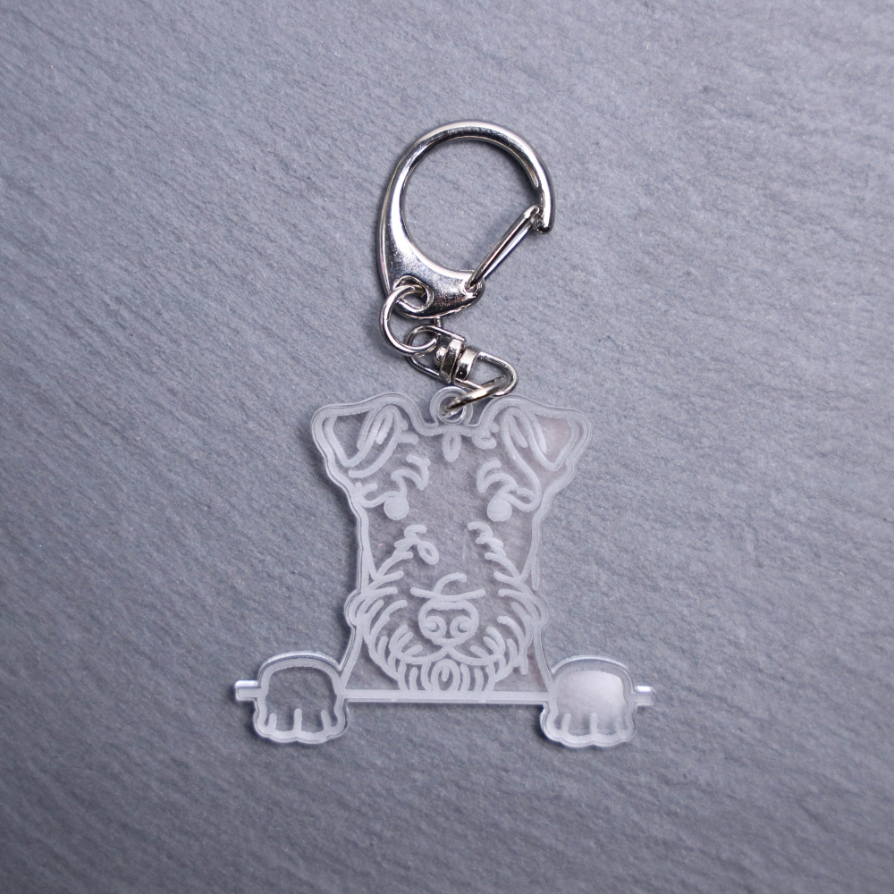 Airedale Terrier Bag Tag. This bag tag is made with engraved acrylic. Comes with lobster clasp topper that easily hooks to a bag, zippers, keychains,