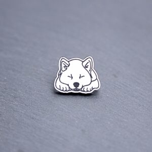 Akita Engraved Acrylic Pin. These acrylic pins are made with engraved cast acrylic. These pins are white and black with a black pin back.