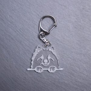 American Eskimo Bag Tag. This bag tag is made with engraved acrylic. Comes with lobster clasp topper that easily hooks to a bag, zippers, keychains,