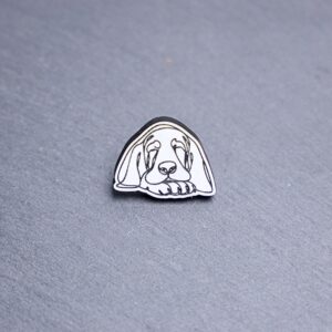 Basset Hound Engraved Acrylic Pin. These acrylic pins are made with engraved cast acrylic. These pins are white and black with a black pin back.