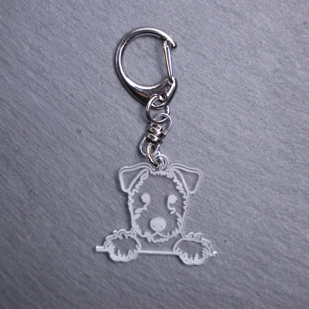 Bedlington Terrier Bag Tag. This bag tag is made with engraved acrylic. Comes with lobster clasp topper that easily hooks to a bag, zippers, keychains,