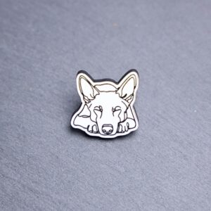 Belgian Malinois Engraved Acrylic Pin. These acrylic pins are made with engraved cast acrylic. These pins are white and black with a black pin back.