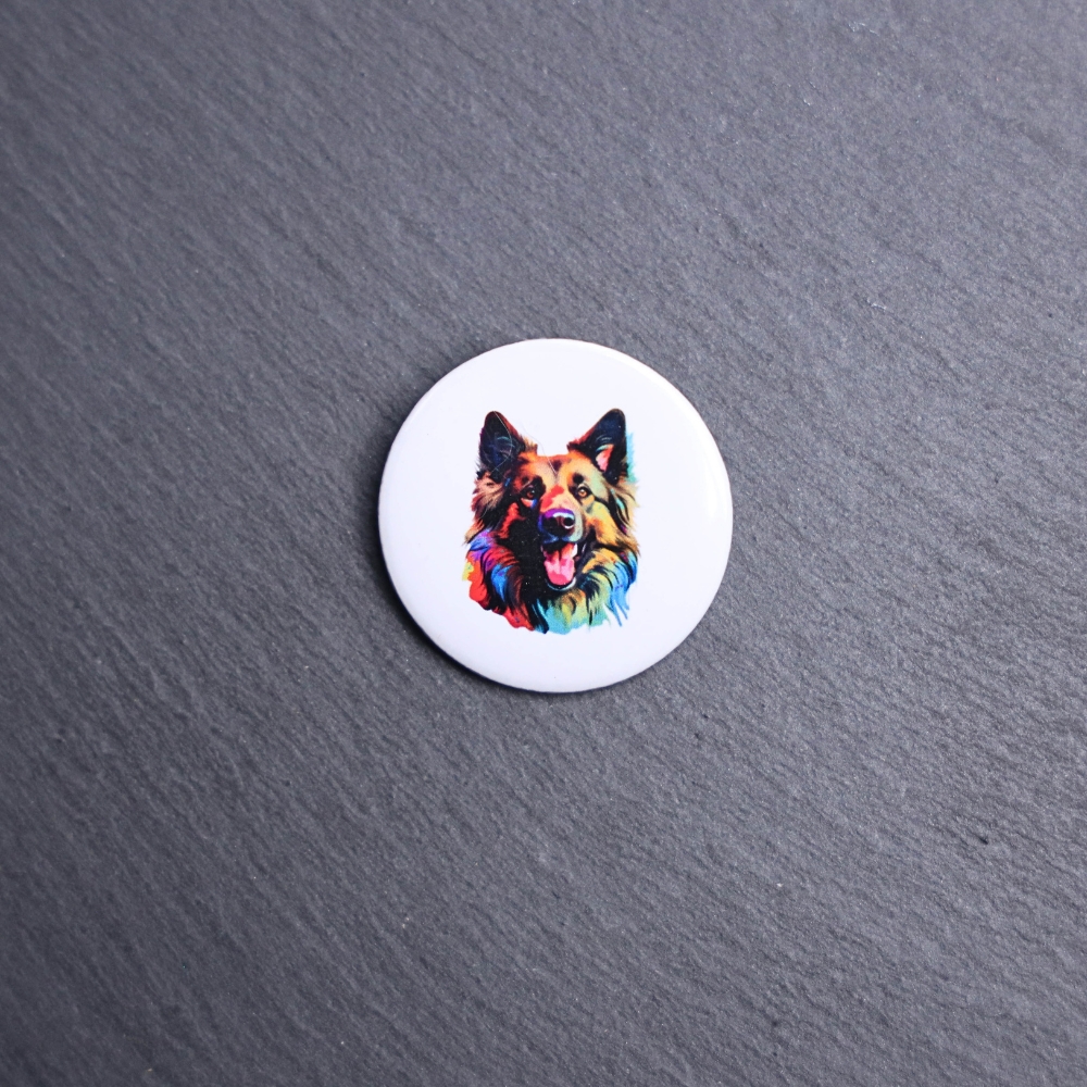 Belgian Tervuren Watercolor Button. These buttons are made with photo paper, metal round, and metal backing. These buttons are vibrant and fun to use on bags or vests.
