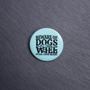 Beware Of Dogs They Will Steal Your Heart Button. These buttons are made with photo paper, metal round, and metal backing. These buttons are vibrant and fun to use on bags or vests.