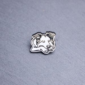 Border Collie Engraved Acrylic Pin. These acrylic pins are made with engraved cast acrylic. These pins are white and black with a black pin back.