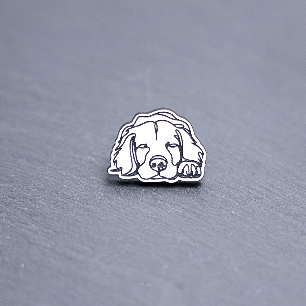 Brittany Engraved Acrylic Pin. These acrylic pins are made with engraved cast acrylic. These pins are white and black with a black pin back.