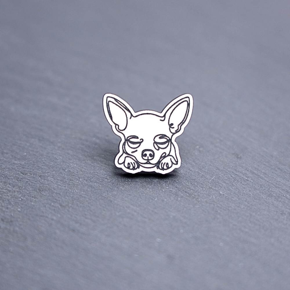 Chihuahua Engraved Acrylic Pin. These acrylic pins are made with engraved cast acrylic. These pins are white and black with a black pin back.