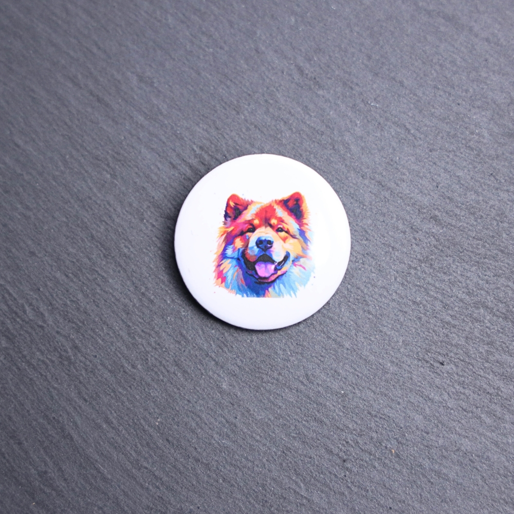 Chow Chow Watercolor Button. These buttons are made with photo paper, metal round, and metal backing. These buttons are vibrant and fun to use on bags or vests.