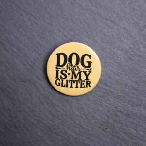 Dog Hair Is My Glitter Button. These buttons are made with photo paper, metal round, and metal backing. These buttons are vibrant and fun to use on bags or vests.