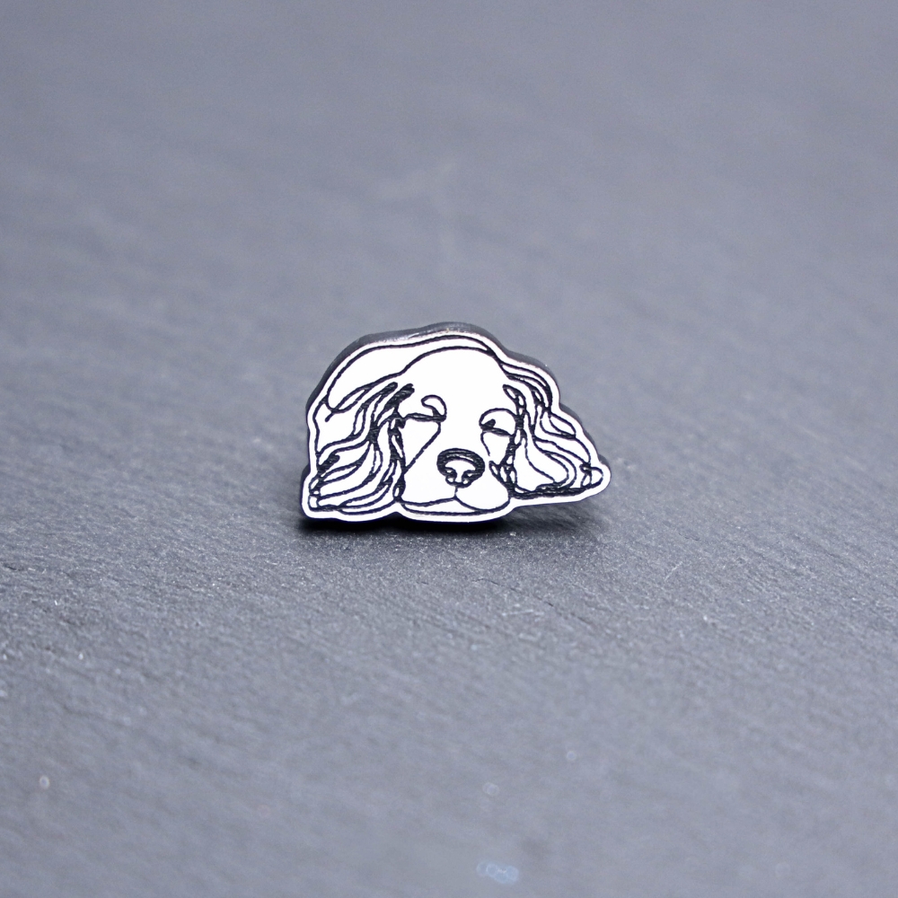 English Cocker Spaniel Engraved Acrylic Pin. These acrylic pins are made with engraved cast acrylic. These pins are white and black with a black pin back.