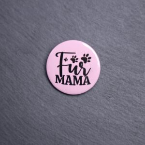 Fur Mama Button. These buttons are made with photo paper, metal round, and metal backing. These buttons are vibrant and fun to use on bags or vests.