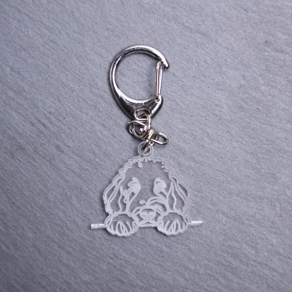 Golden Doodle Bag Tag. This bag tag is made with engraved acrylic. Comes with lobster clasp topper that easily hooks to a bag, zippers, keychains,