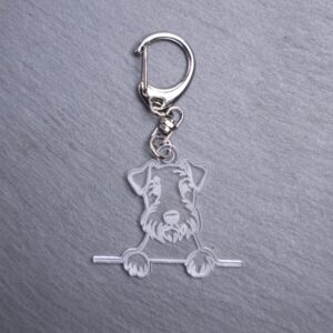 Irish Terrier Bag Tag. This bag tag is made with engraved acrylic. Comes with lobster clasp topper that easily hooks to a bag, zippers, keychains,