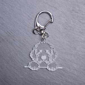 Komondor Bag Tag. This bag tag is made with engraved acrylic. Comes with lobster clasp topper that easily hooks to a bag, zippers, keychains,