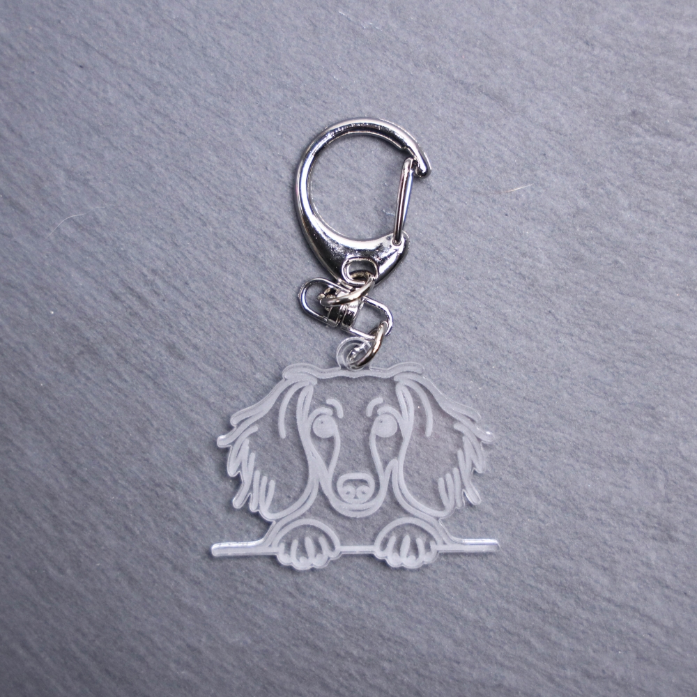 Long Coat Dachshund Bag Tag. This bag tag is made with engraved acrylic. Comes with lobster clasp topper that easily hooks to a bag, zippers, keychains,