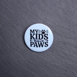 My Kids Have Paws Button. These buttons are made with photo paper, metal round, and metal backing. These buttons are vibrant and fun to use on bags or vests.