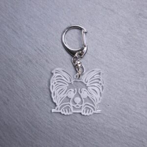 Papillon Bag Tag. This bag tag is made with engraved acrylic. Comes with lobster clasp topper that easily hooks to a bag, zippers, keychains,