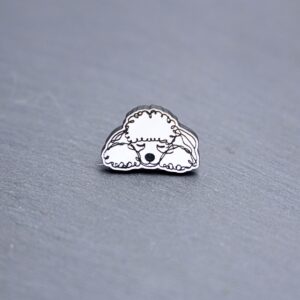 Poodle Engraved Acrylic Pin. These acrylic pins are made with engraved cast acrylic. These pins are white and black with a black pin back.
