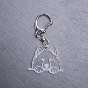Samoyed Bag Tag. This bag tag is made with engraved acrylic. Comes with lobster clasp topper that easily hooks to a bag, zippers, keychains,