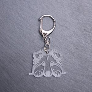 Shetland Sheepdog Bag Tag. This bag tag is made with engraved acrylic. Comes with lobster clasp topper that easily hooks to a bag, zippers, keychains,