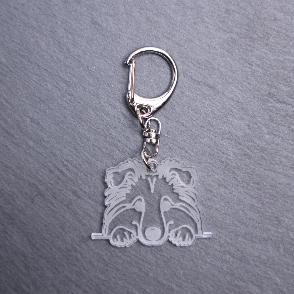 Shetland Sheepdog Bag Tag. This bag tag is made with engraved acrylic. Comes with lobster clasp topper that easily hooks to a bag, zippers, keychains,