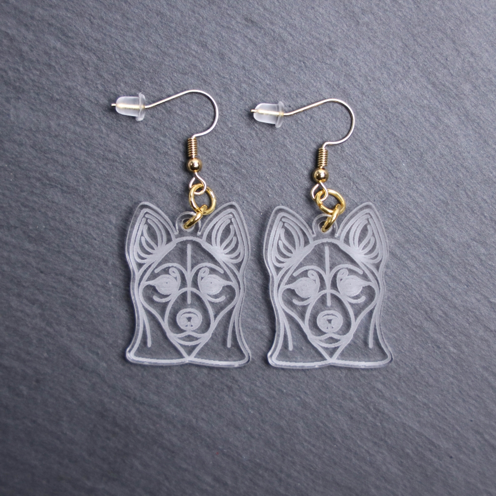 Alaskan Klee Kai Earrings. These earrings are made with engraved acrylic. Comes with gold hooks that is nickel free. Adorable dangle earrings for dog lovers.