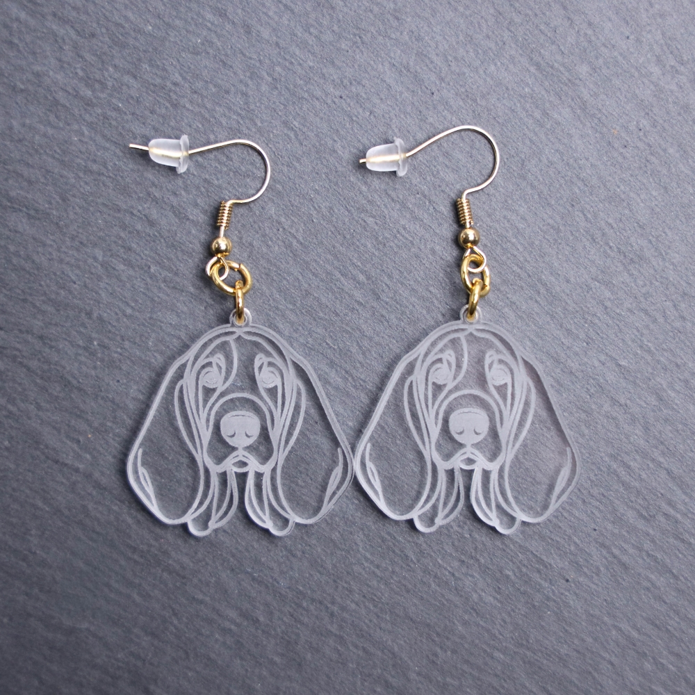 Bassador Earrings. These earrings are made with engraved acrylic. Comes with gold hooks that is nickel free. Adorable dangle earrings for dog lovers.