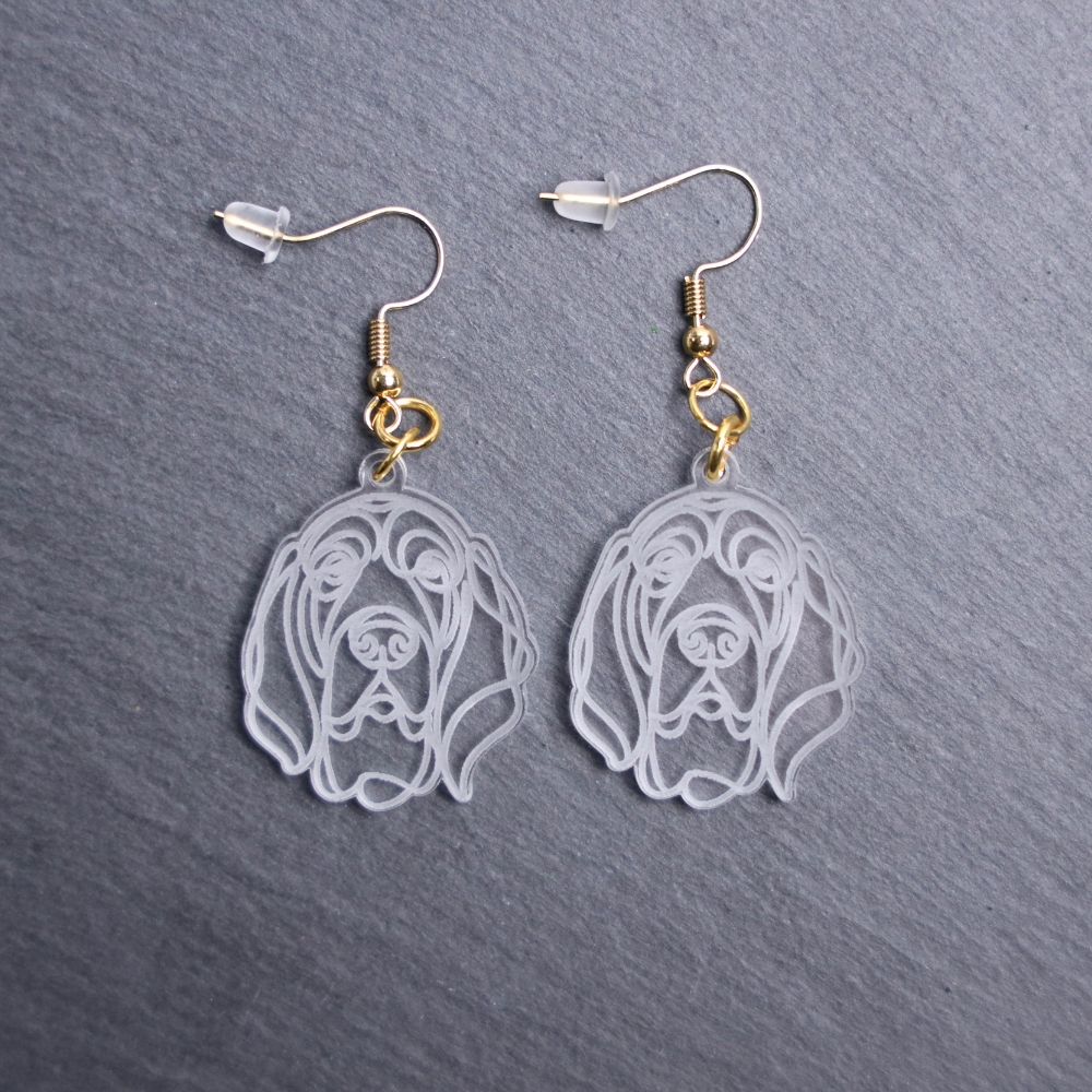 Bloodhound Earrings. These earrings are made with engraved acrylic. Comes with gold hooks that is nickel free. Adorable dangle earrings for dog lovers.