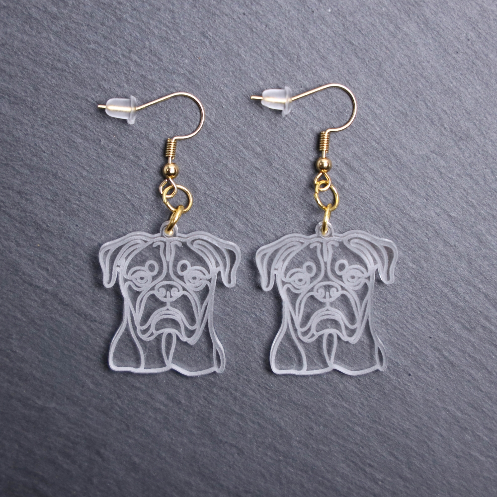 Boxer Earrings. These earrings are made with engraved acrylic. Comes with gold hooks that is nickel free. Adorable dangle earrings for dog lovers.