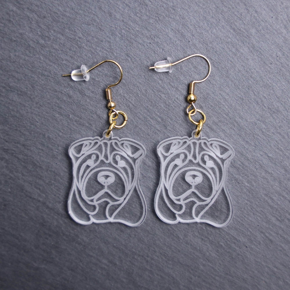 Chinese Shar Pei Earrings. These earrings are made with engraved acrylic. Comes with gold hooks that is nickel free. Adorable dangle earrings for dog lovers.