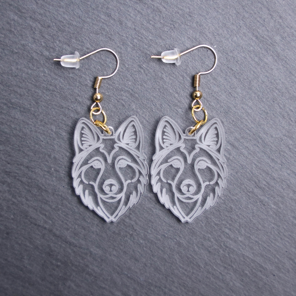 Czech Wolf Dog Earrings. These earrings are made with engraved acrylic. Comes with gold hooks that is nickel free. Adorable dangle earrings for dog lovers.