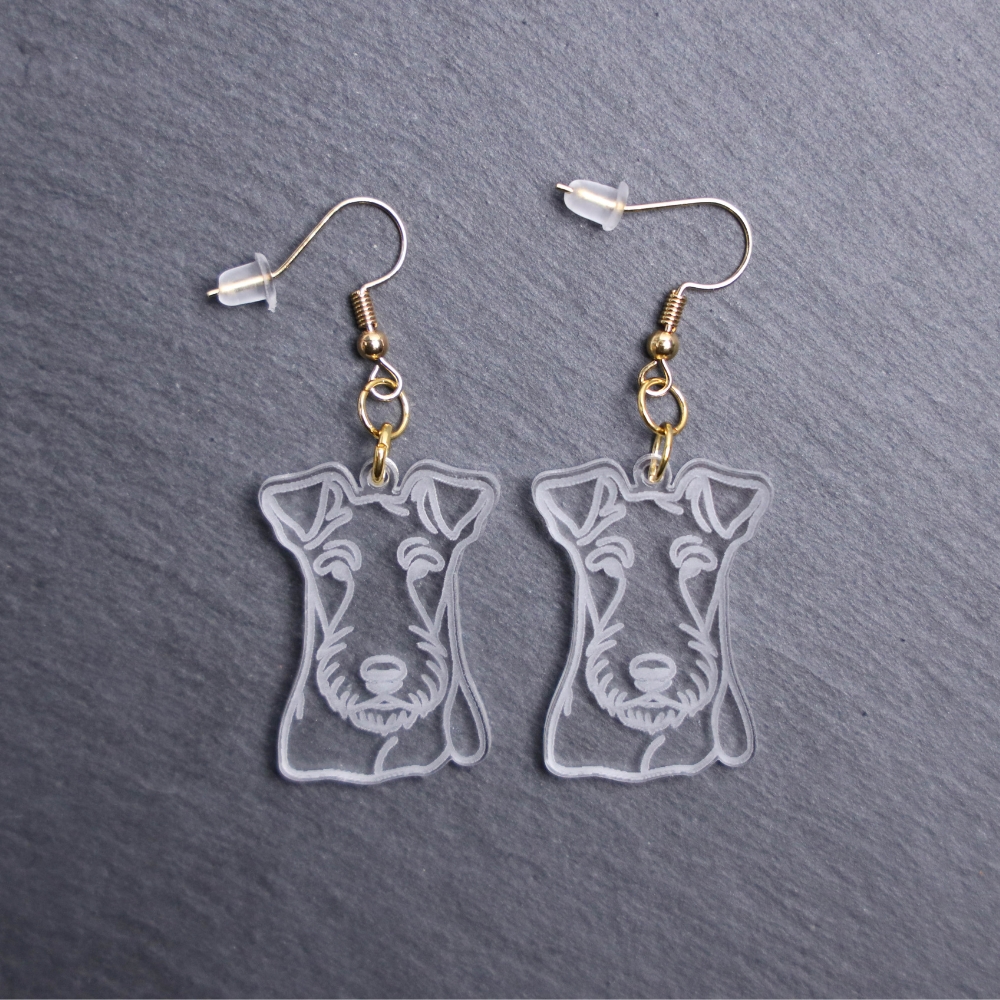 Fox Terrier Earrings. These earrings are made with engraved acrylic. Comes with gold hooks that is nickel free. Adorable dangle earrings for dog lovers.
