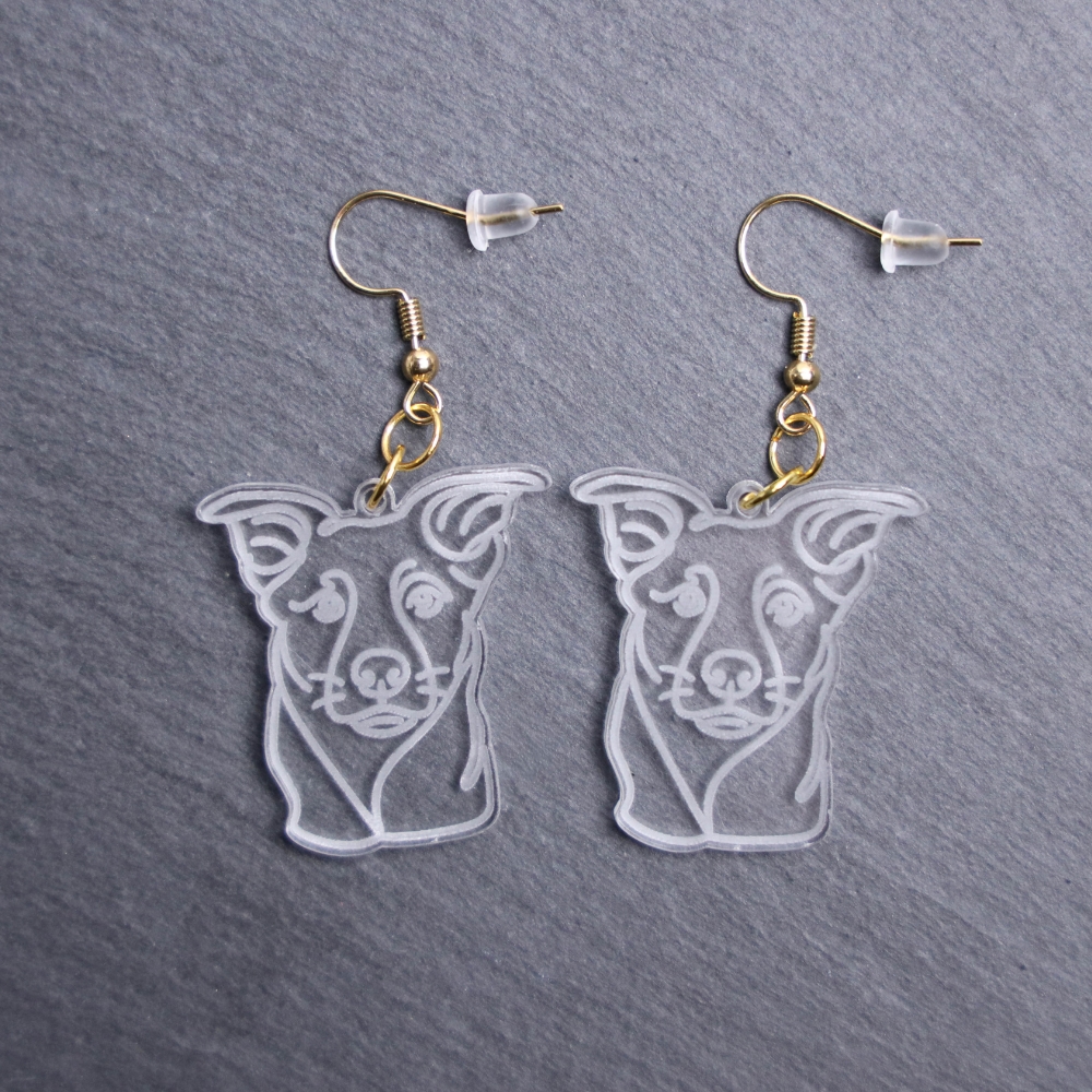 Heeler Earrings. These earrings are made with engraved acrylic. Comes with gold hooks that is nickel free. Adorable dangle earrings for dog lovers.
