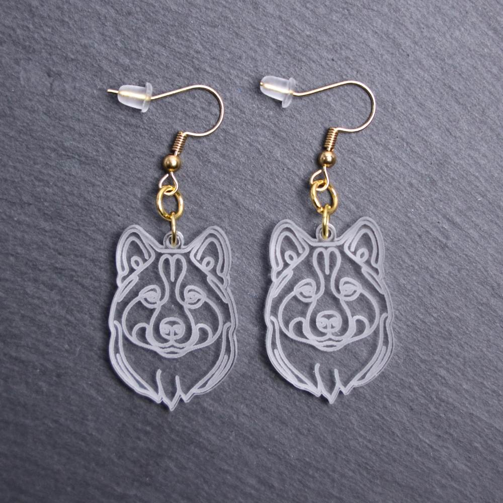 Korean Jindo Dog Earrings. These earrings are made with engraved acrylic. Comes with gold hooks that is nickel free. Adorable dangle earrings for dog lovers.