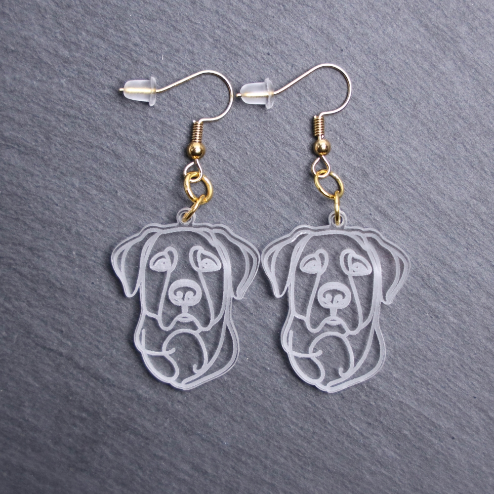 Lab Shepherd Mix Earrings. These earrings are made with engraved acrylic. Comes with gold hooks that is nickel free. Adorable dangle earrings for dog lovers.
