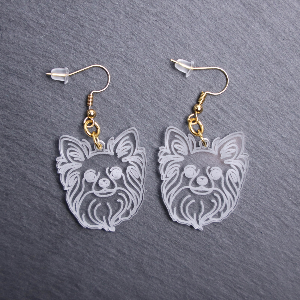 Long Coat Chihuahua Earrings. These earrings are made with engraved acrylic. Comes with gold hooks that is nickel free. Adorable dangle earrings for dog lovers.