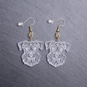 Mini Schnauzer Earrings. These earrings are made with engraved acrylic. Comes with gold hooks that is nickel free. Adorable dangle earrings for dog lovers.