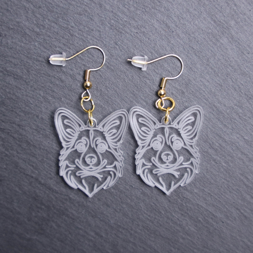 Pembroke Welsh Corgi Earrings. These earrings are made with engraved acrylic. Comes with gold hooks that is nickel free. Adorable dangle earrings for dog lovers.