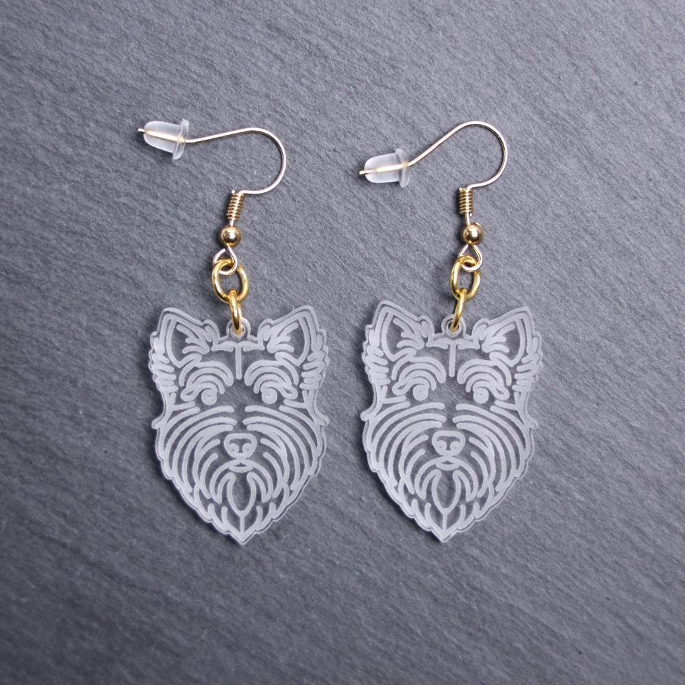 Scottish Terrier Earrings. These earrings are made with engraved acrylic. Comes with gold hooks that is nickel free. Adorable dangle earrings for dog lovers.