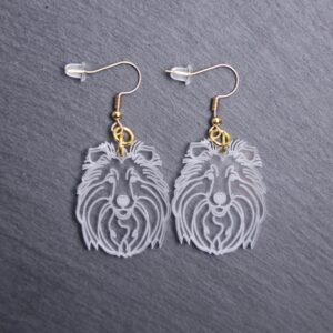 Shetland Sheepdog Earrings. These earrings are made with engraved acrylic. Comes with gold hooks that is nickel free. Adorable dangle earrings for dog lovers.